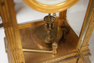 A large 19th century French four glass mantel clock, with key and pendulum, 37cm. Condition - fair to good, not tested